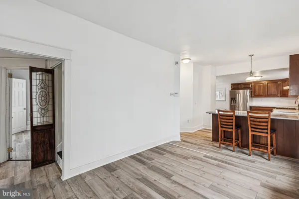 a kitchen with stainless steel appliances granite countertop a stove and a sink