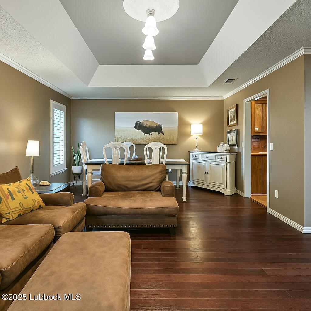 208 South Holliday Plainview, TX 79072 - Photo 19 of 32 a living room with furniture and kitchen view