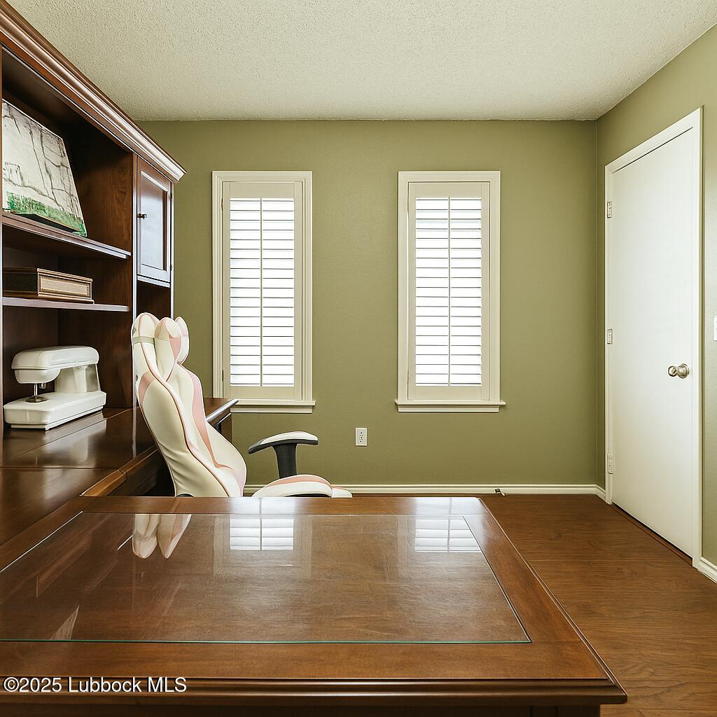 208 South Holliday Plainview, TX 79072 - Photo 28 of 32 a view of a room with furniture and a window