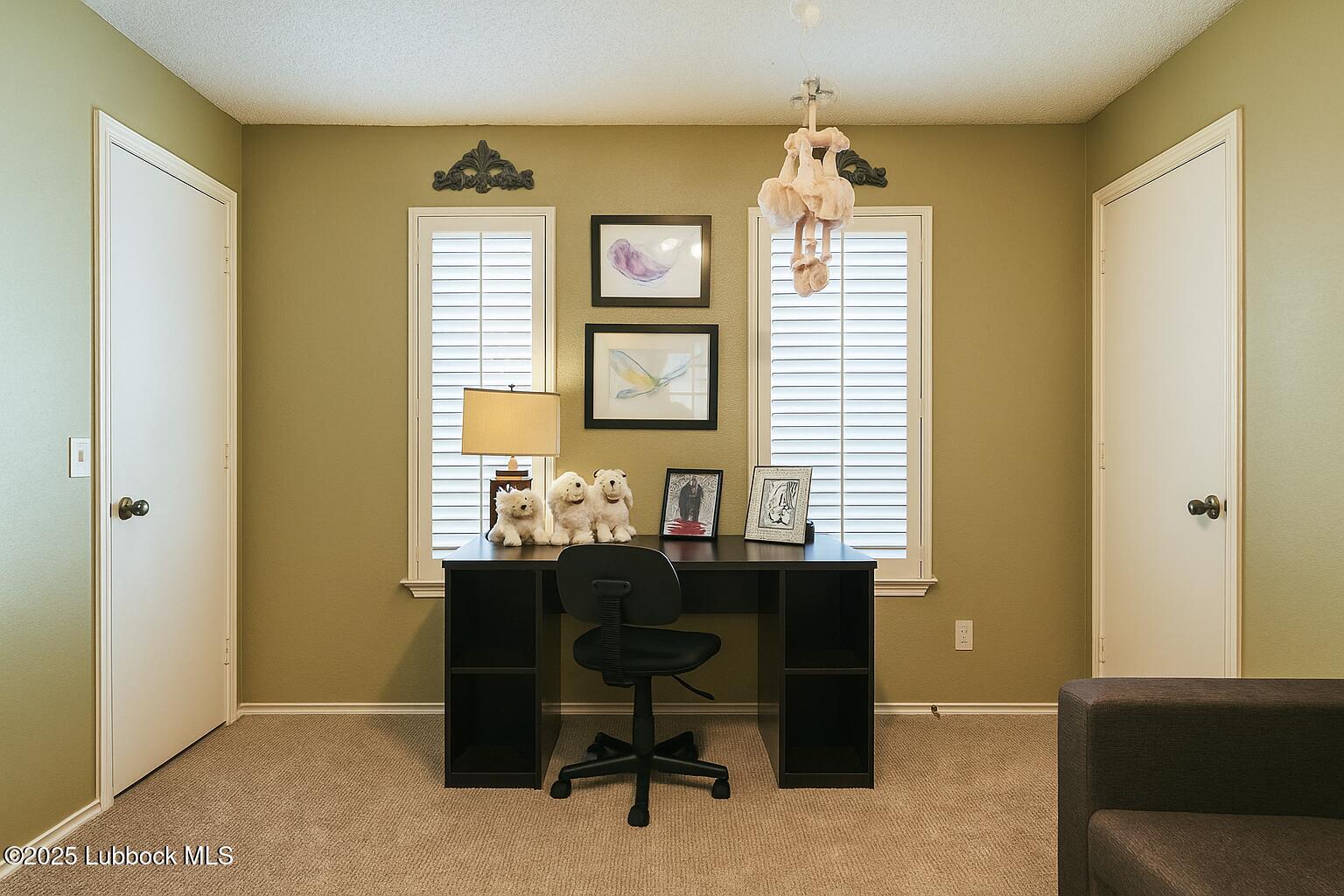 208 South Holliday Plainview, TX 79072 - Photo 30 of 32 a view of a workspace with furniture and a window
