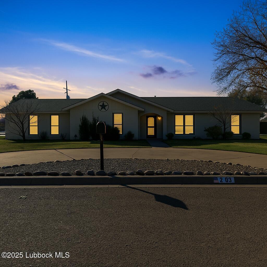 208 South Holliday Plainview, TX 79072 - Photo 31 of 32 a front view of a house with a garden