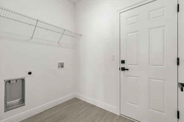 a view of a room with racks on the wall