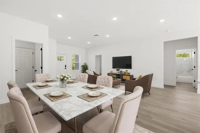 a view of a dining room with furniture