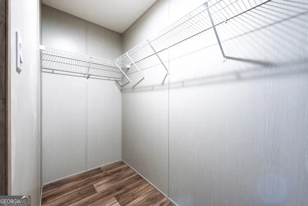 a view of a room with racks on the wall