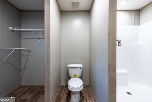 a bathroom with a toilet
