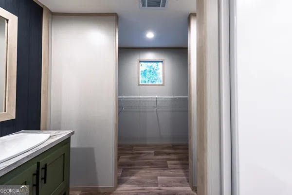 a view of hallway with washer and dryer