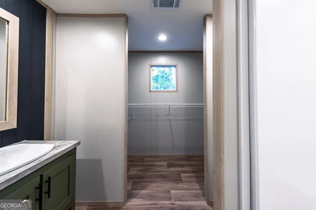 a view of hallway with washer and dryer