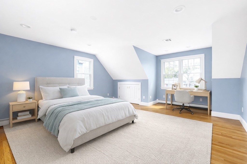 51 Stockdale Road Needham, MA 02492 - Photo 14 of 21 a bedroom with a bed and a window