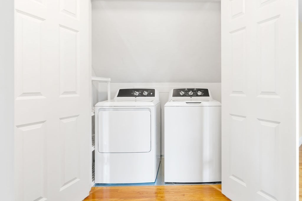 51 Stockdale Road Needham, MA 02492 - Photo 15 of 21 a utility room with dryer and washer