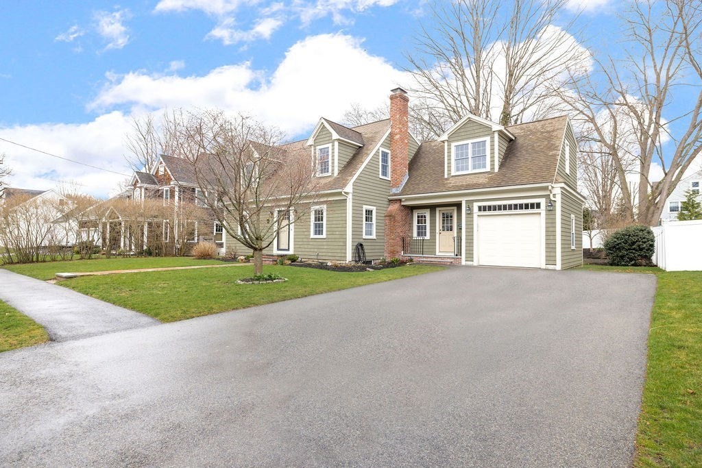 51 Stockdale Road Needham, MA 02492 - Photo 2 of 21 a view of a big building with a big yard and large trees