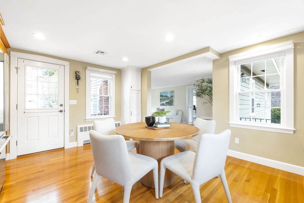 51 Stockdale Road Needham, MA 02492 - Photo 4 of 21 a dining room with furniture and wooden floor