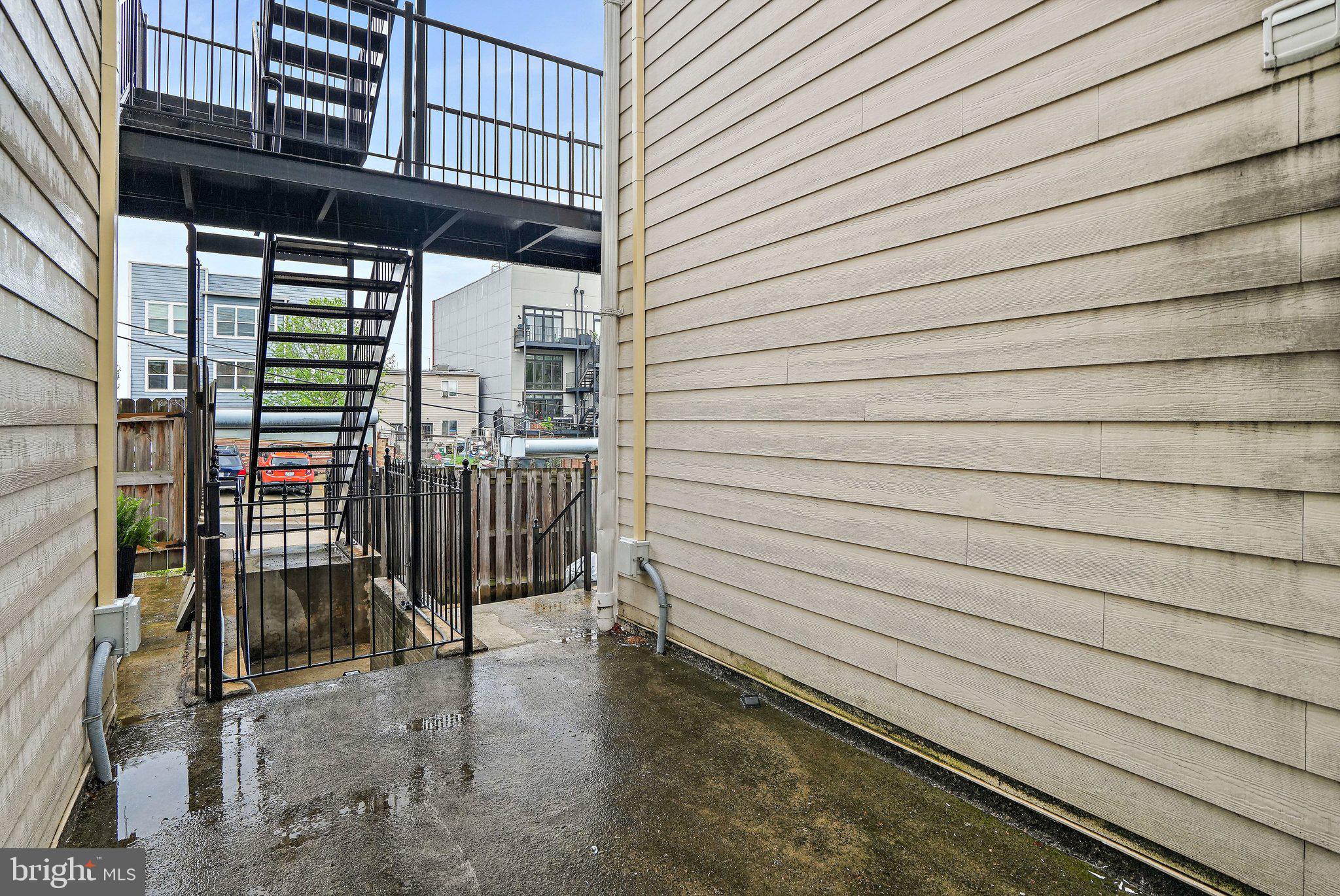 1921 2nd Street Northeast, Unit 102 Washington, DC 20002 - Photo 17 of 19 Walk out to storage and parking lot
