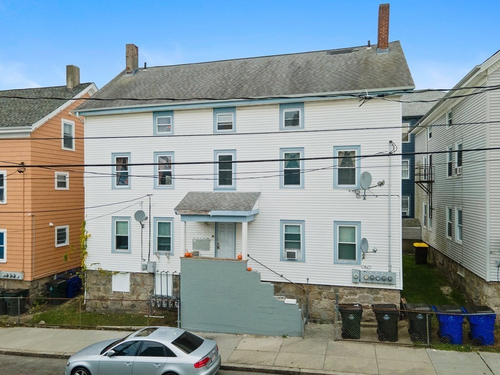 152 Fountain Street Fall River, MA 02721 - Photo 2 of 27 a front view of a house with balcony