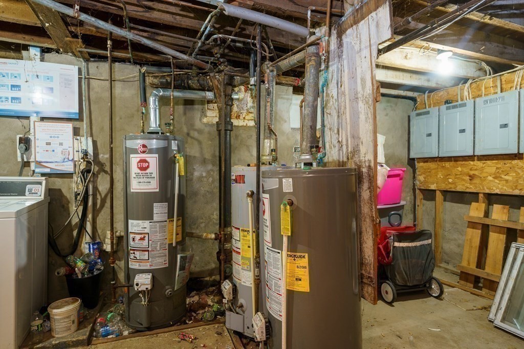 152 Fountain Street Fall River, MA 02721 - Photo 25 of 27 a utility room with dryer and washer