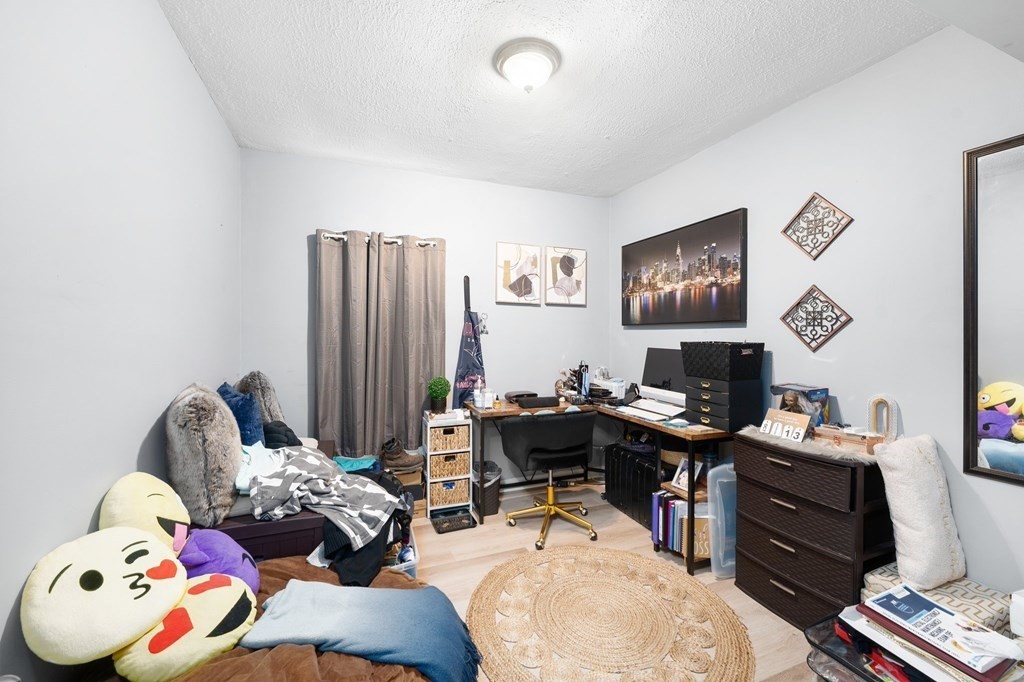 152 Fountain Street Fall River, MA 02721 - Photo 5 of 27 a bedroom with a workspace