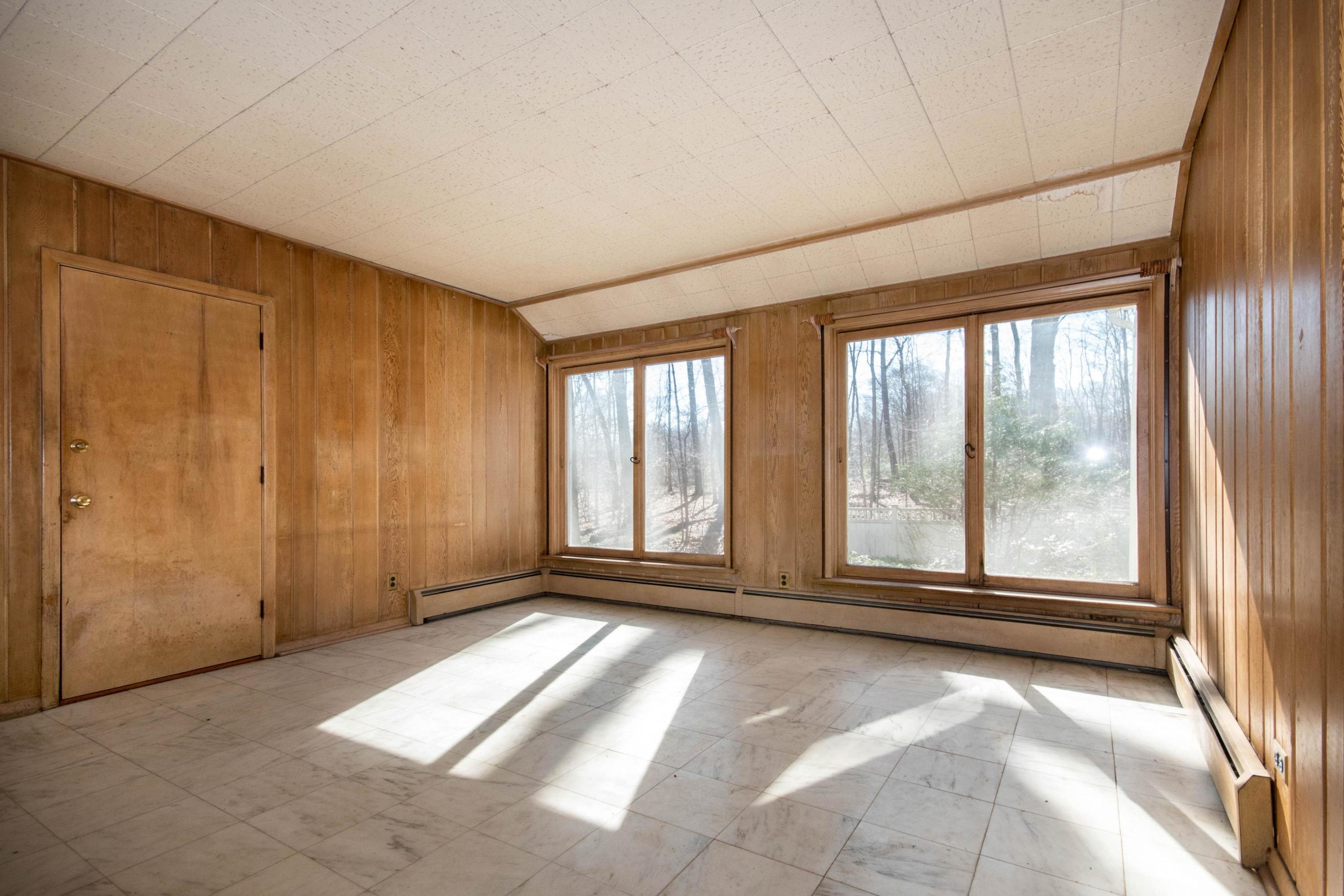 792 Smith Ridge Road New Canaan, CT 06840 - Photo 12 of 18 a view of an empty room with a window