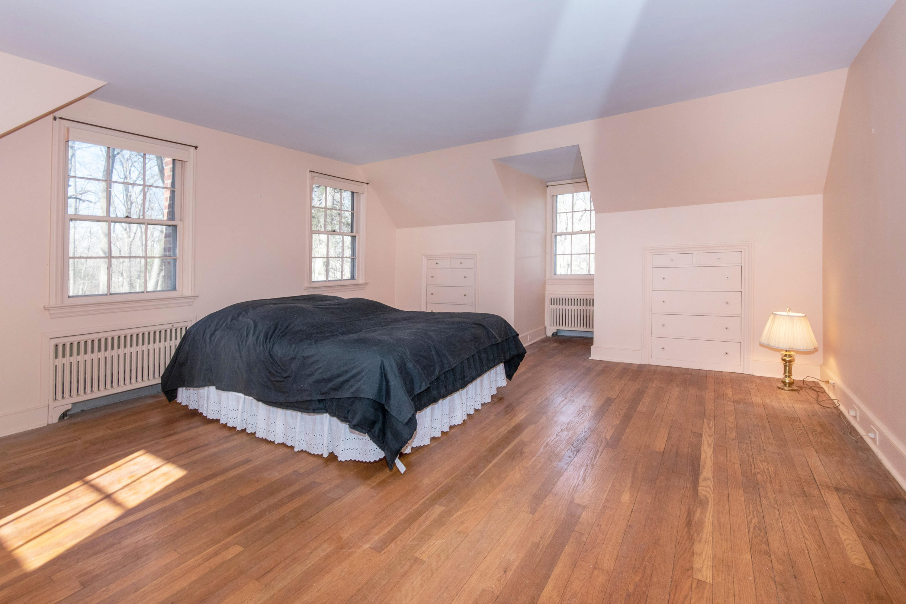 792 Smith Ridge Road New Canaan, CT 06840 - Photo 14 of 18 a bedroom with a bed and window