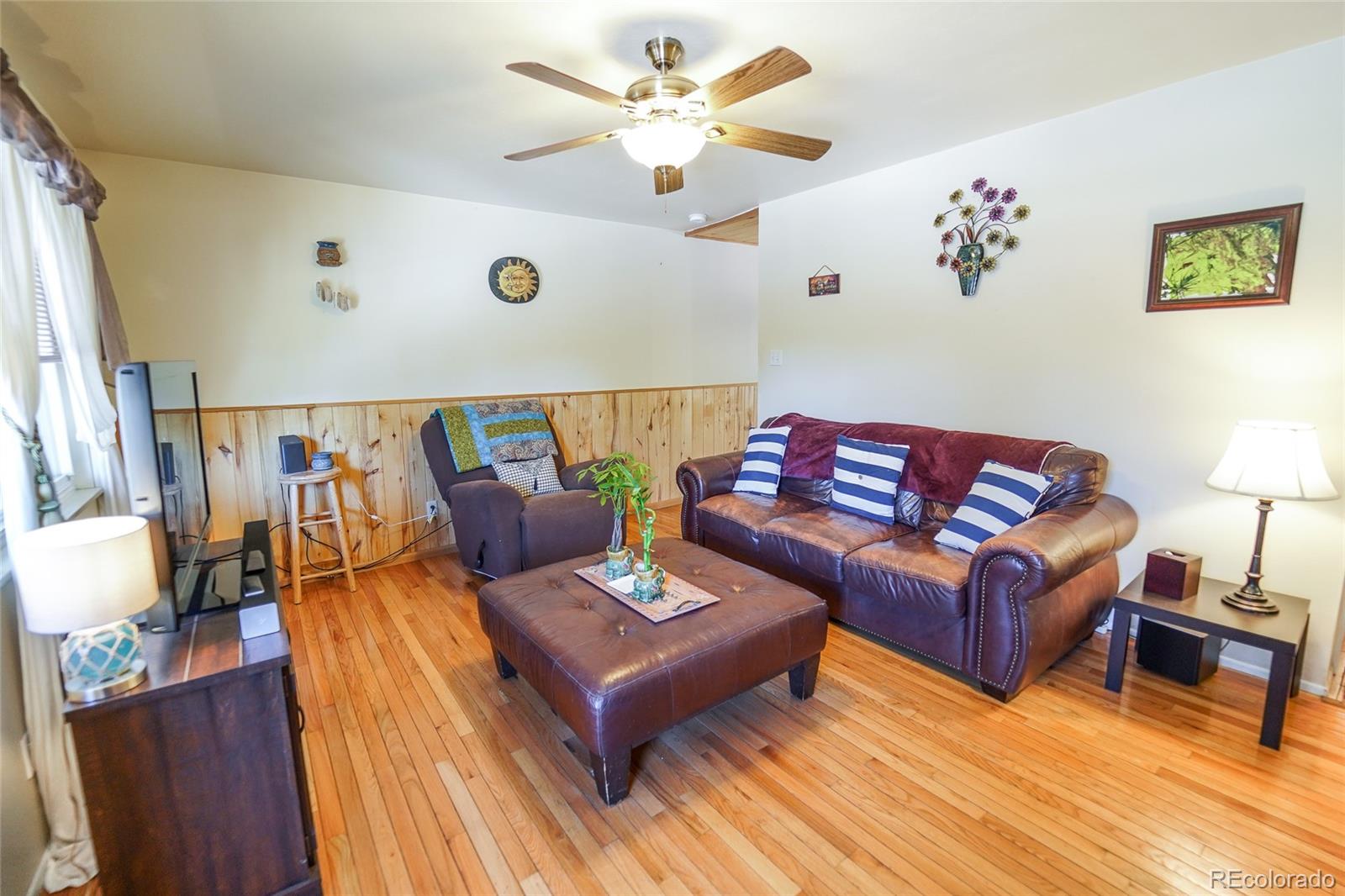 806 Paradise Lane Colorado Springs, CO 80904 - Photo 24 of 45 a living room with furniture and wooden floor