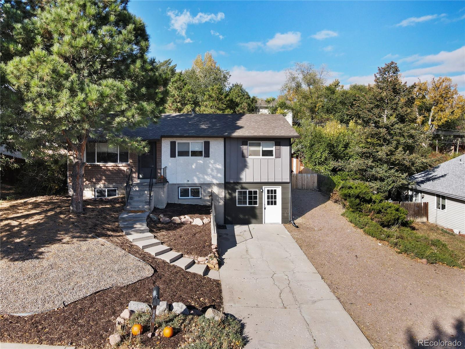 806 Paradise Lane Colorado Springs, CO 80904 - Photo 26 of 45 a view of a house with a patio