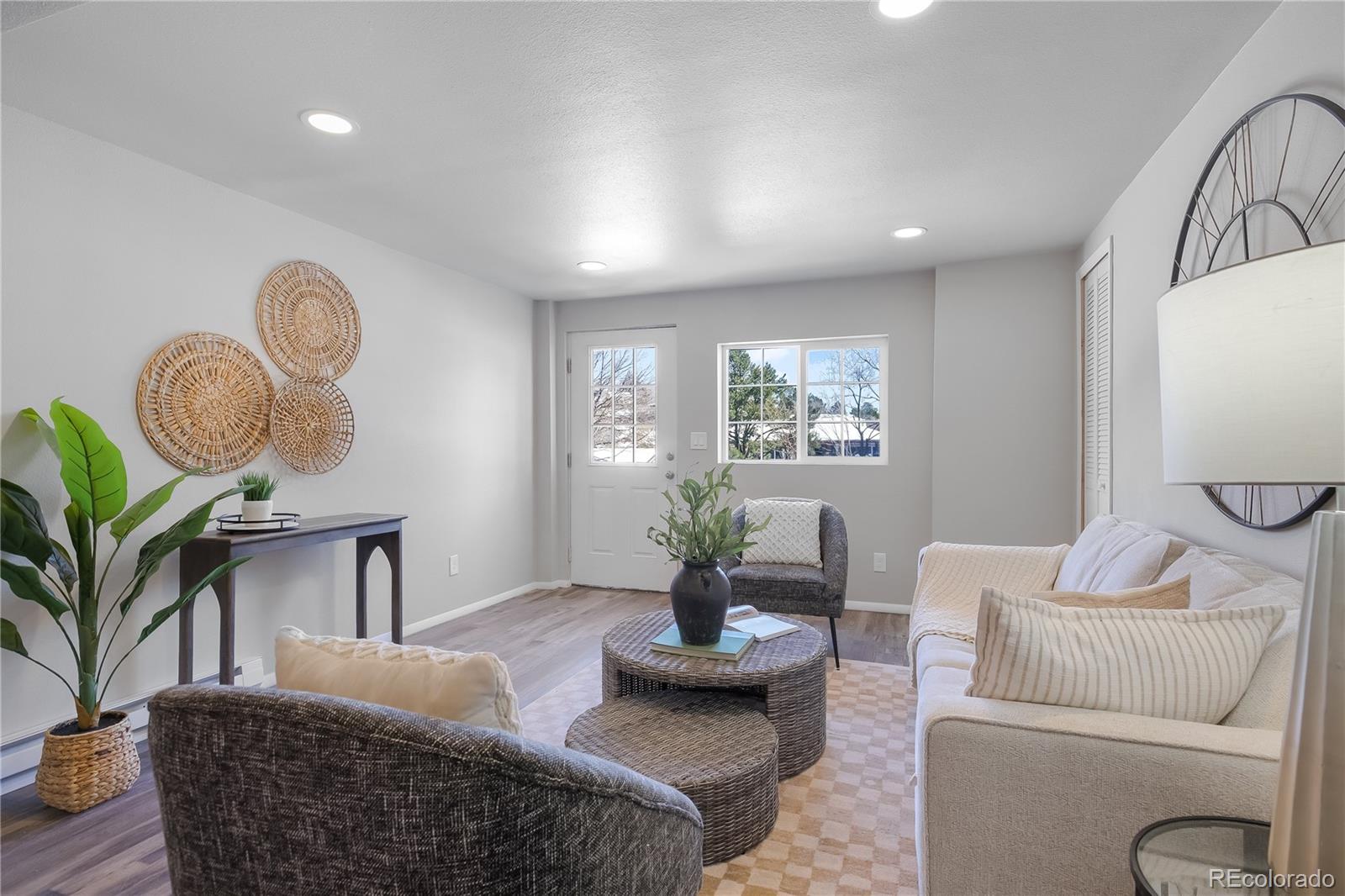 806 Paradise Lane Colorado Springs, CO 80904 - Photo 29 of 45 a living room with furniture flowerpot and window