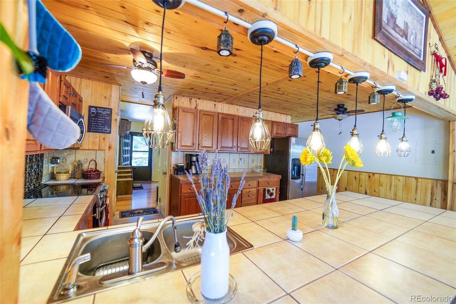 806 Paradise Lane Colorado Springs, CO 80904 - Photo 3 of 45 a view of a patio with a table and chairs