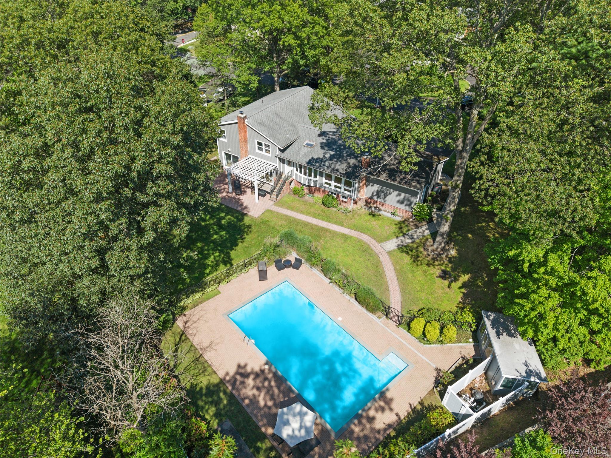 236 Robert Drive New Rochelle, NY 10804 - Photo 1 of 27 an aerial view of a house with a yard and swimming pool