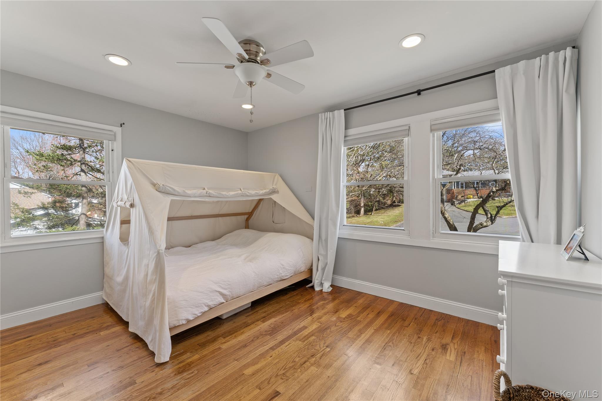 236 Robert Drive New Rochelle, NY 10804 - Photo 12 of 27 a living room with furniture and windows