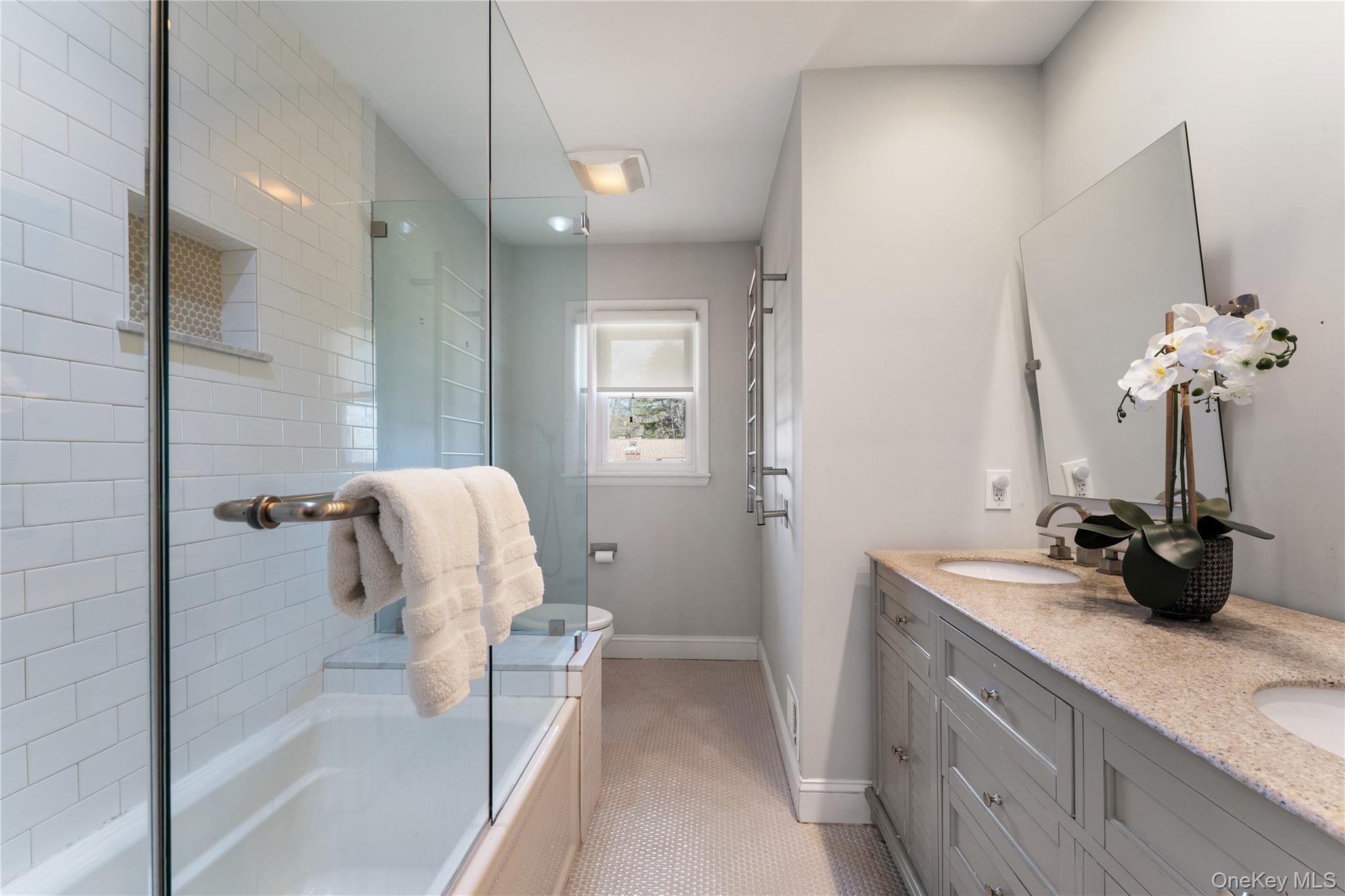 236 Robert Drive New Rochelle, NY 10804 - Photo 13 of 27 a bathroom with a sink a toilet and shower