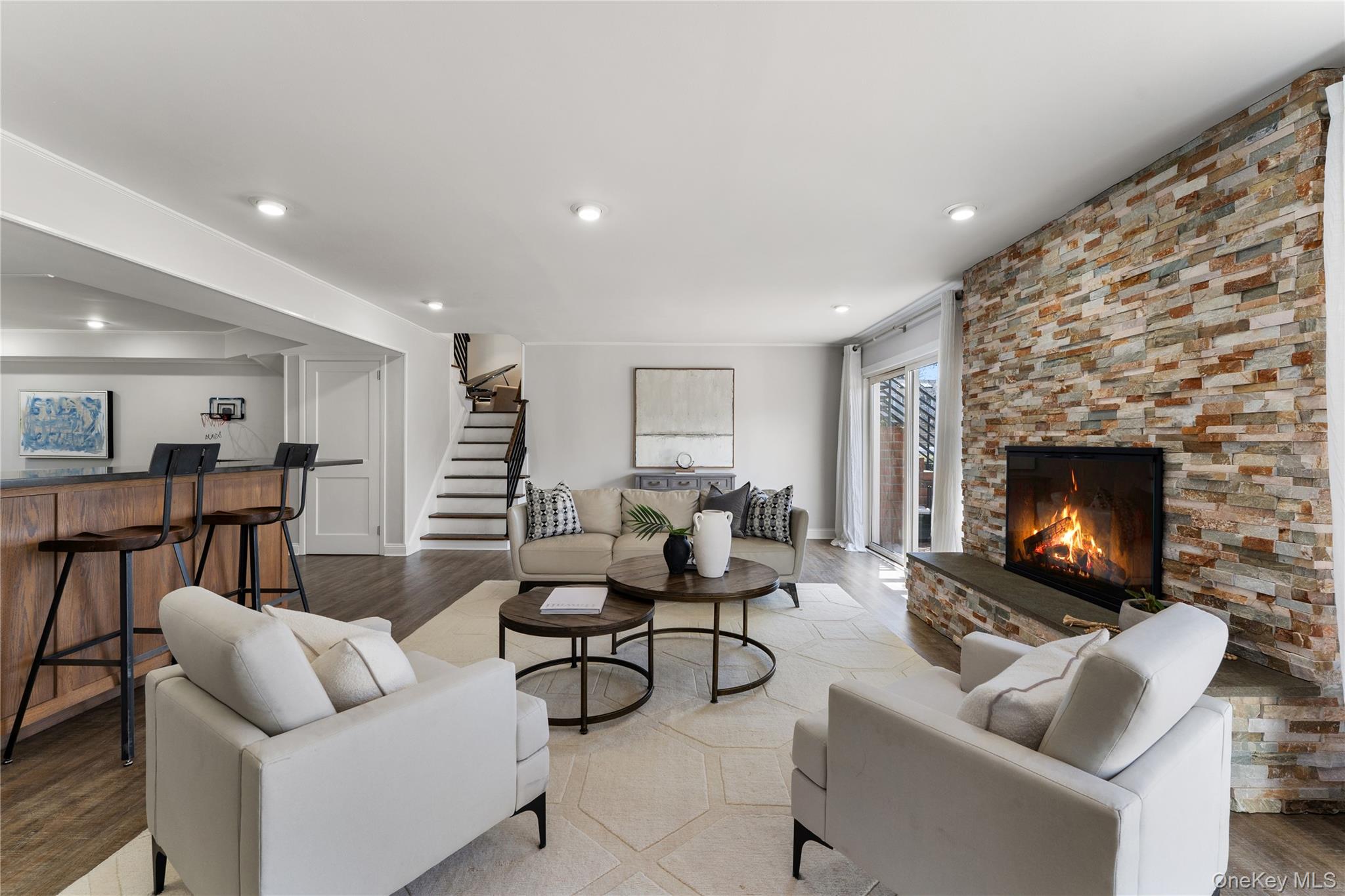 236 Robert Drive New Rochelle, NY 10804 - Photo 15 of 27 a living room with furniture and a fireplace