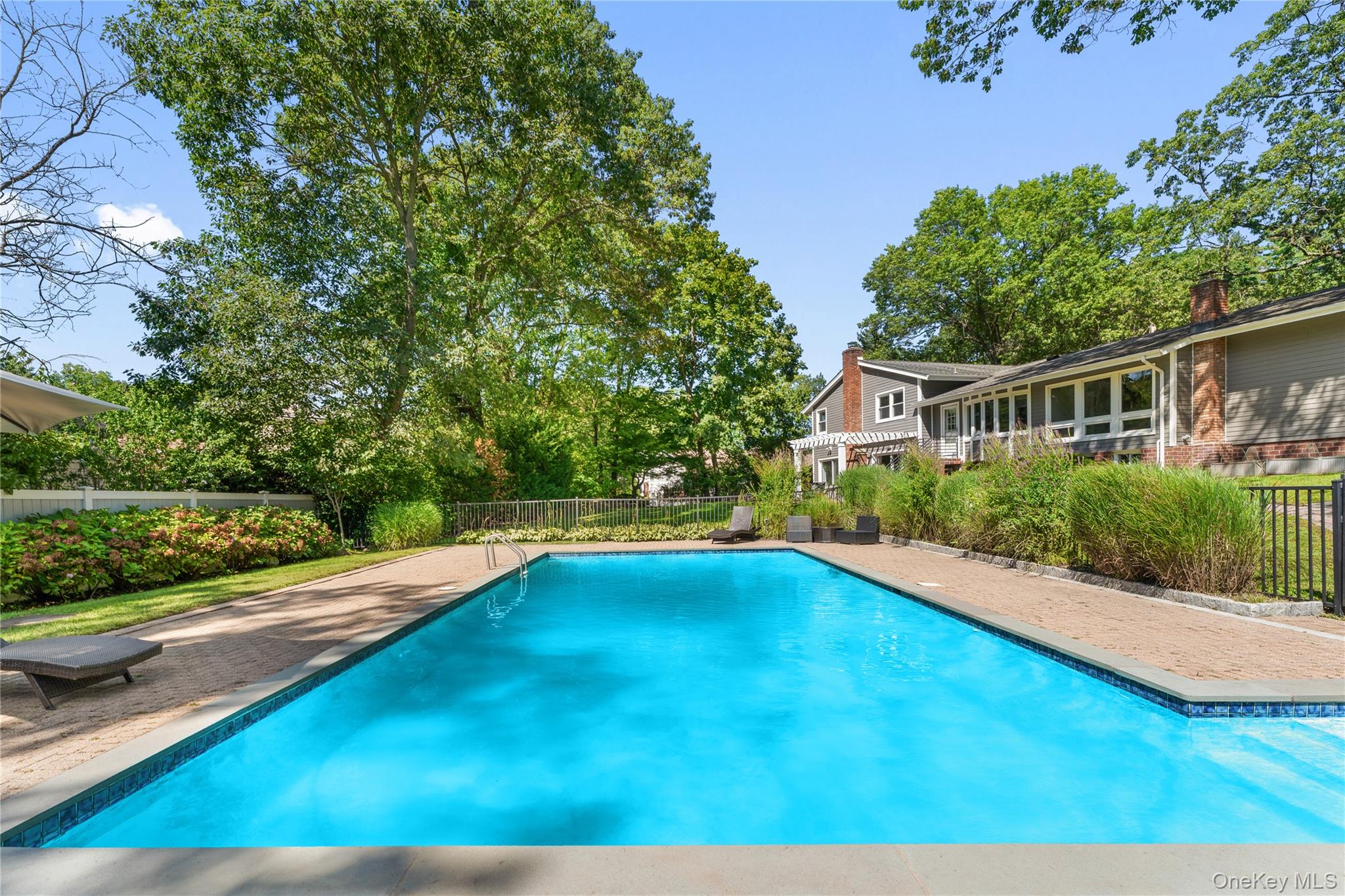 236 Robert Drive New Rochelle, NY 10804 - Photo 21 of 27 a view of swimming pool with an outdoor seating
