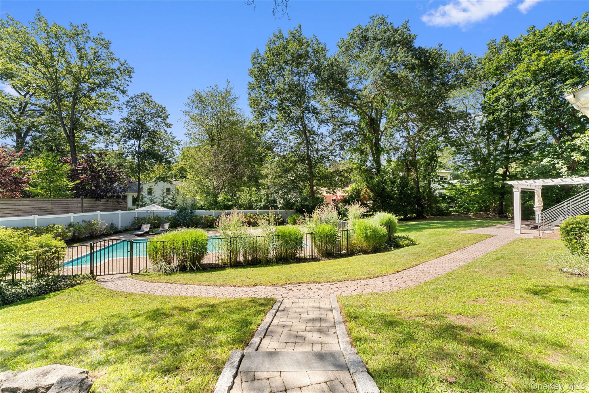 236 Robert Drive New Rochelle, NY 10804 - Photo 23 of 27 a view of a garden with plants