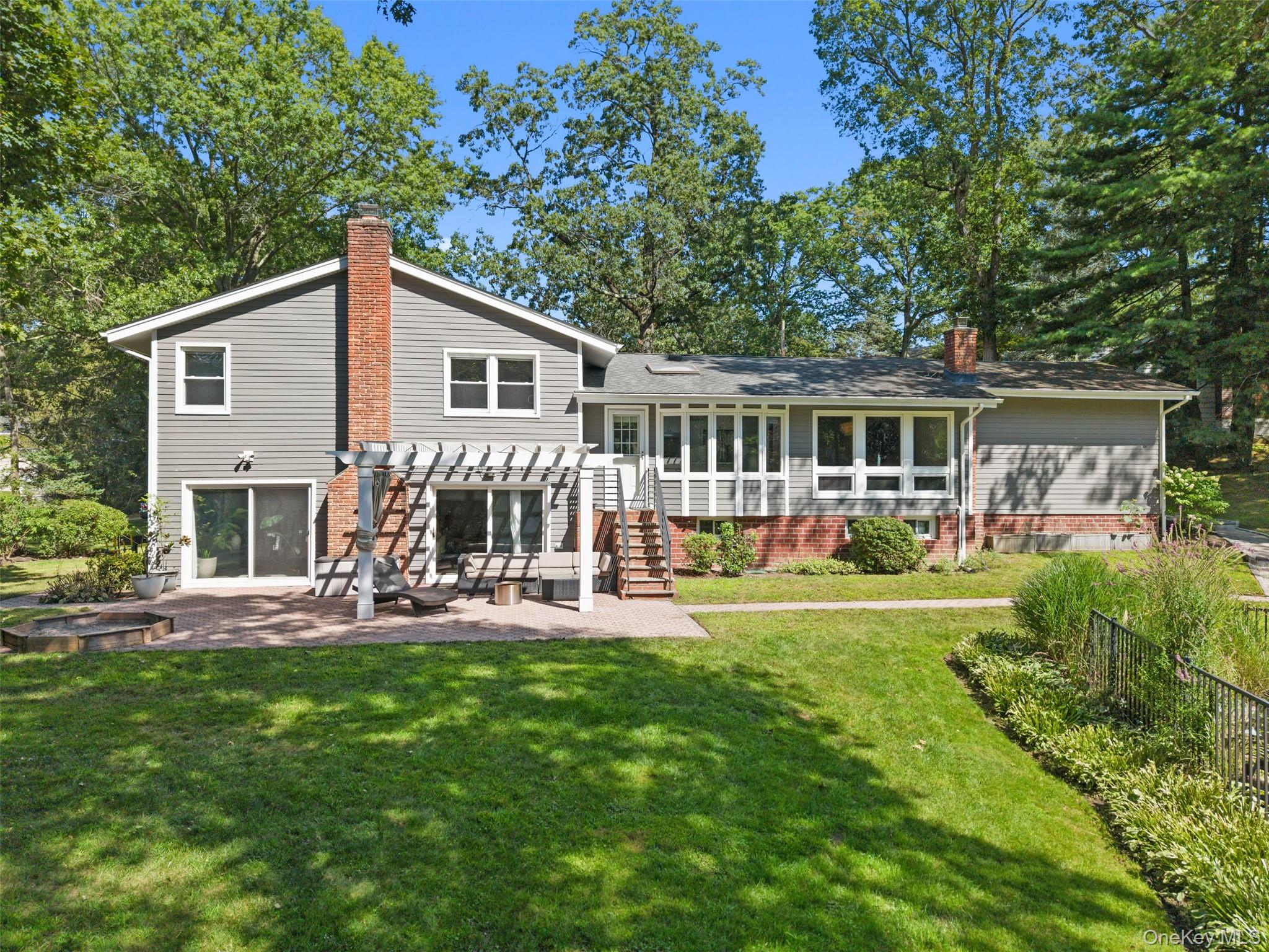 236 Robert Drive New Rochelle, NY 10804 - Photo 24 of 27 a front view of house with yard and outdoor seating