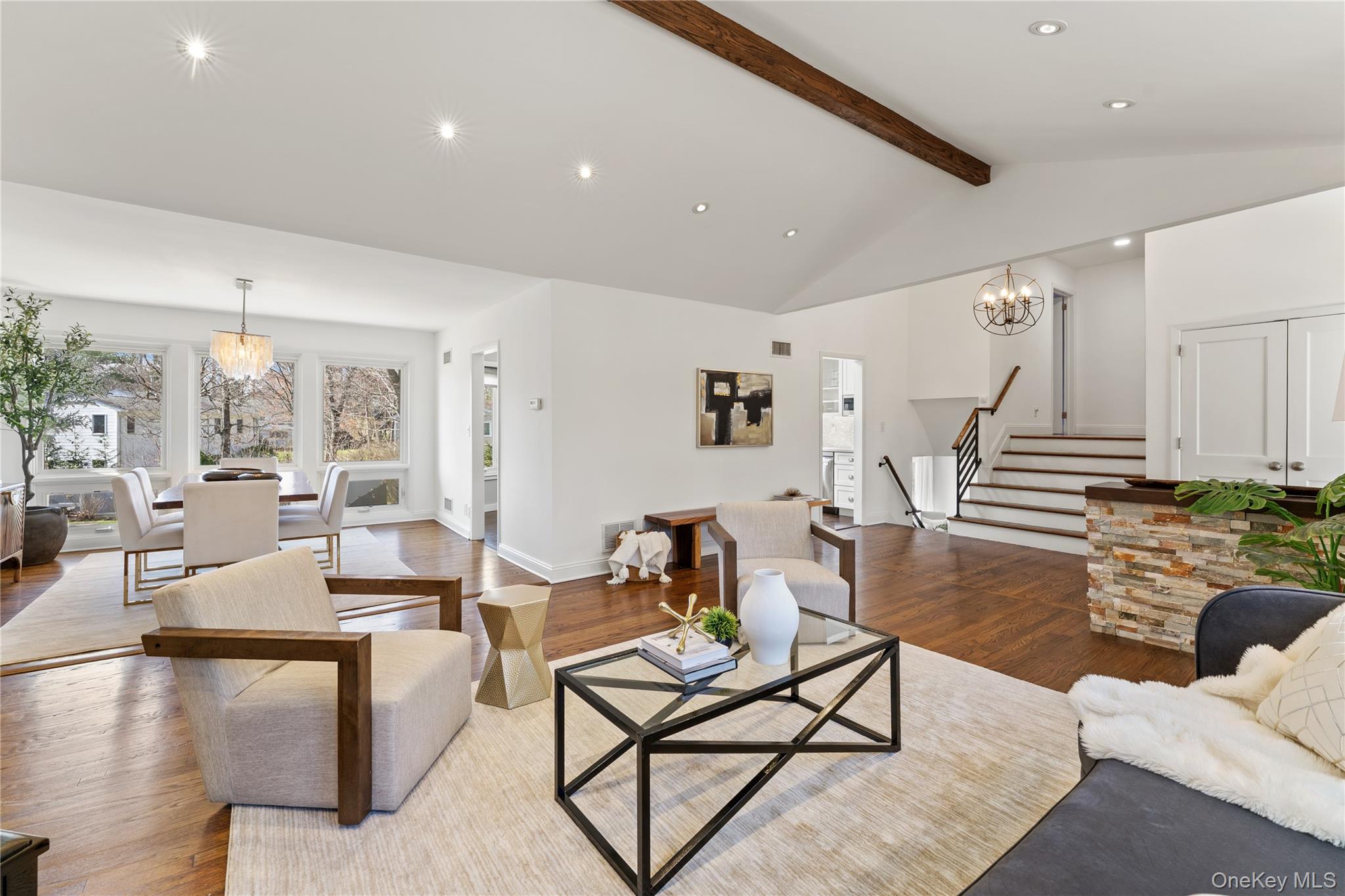 236 Robert Drive New Rochelle, NY 10804 - Photo 5 of 27 a living room with fireplace furniture and a wooden floor