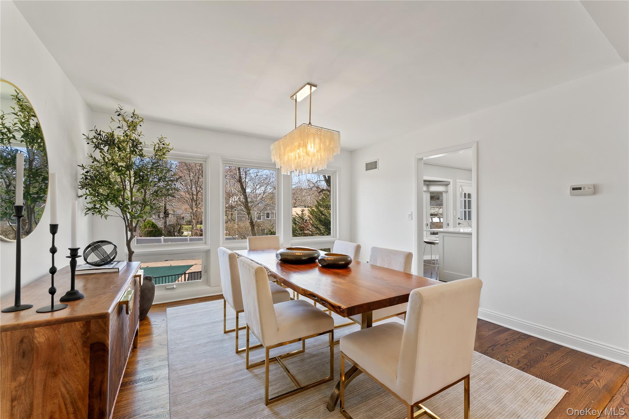 236 Robert Drive New Rochelle, NY 10804 - Photo 6 of 27 a dining room with furniture window and wooden floor