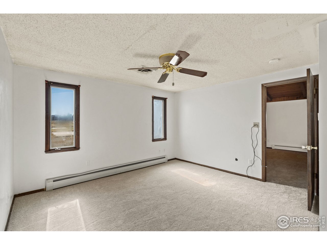 13844 Elmore Road Longmont, CO 80504 - Photo 15 of 34 Primary Bedroom