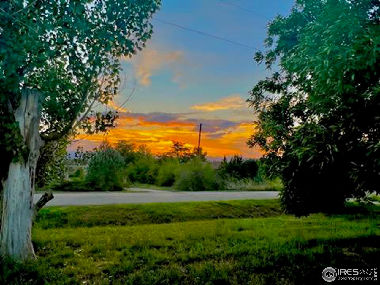 13844 Elmore Road Longmont, CO 80504 - Photo 23 of 34 Sunset from the front patio