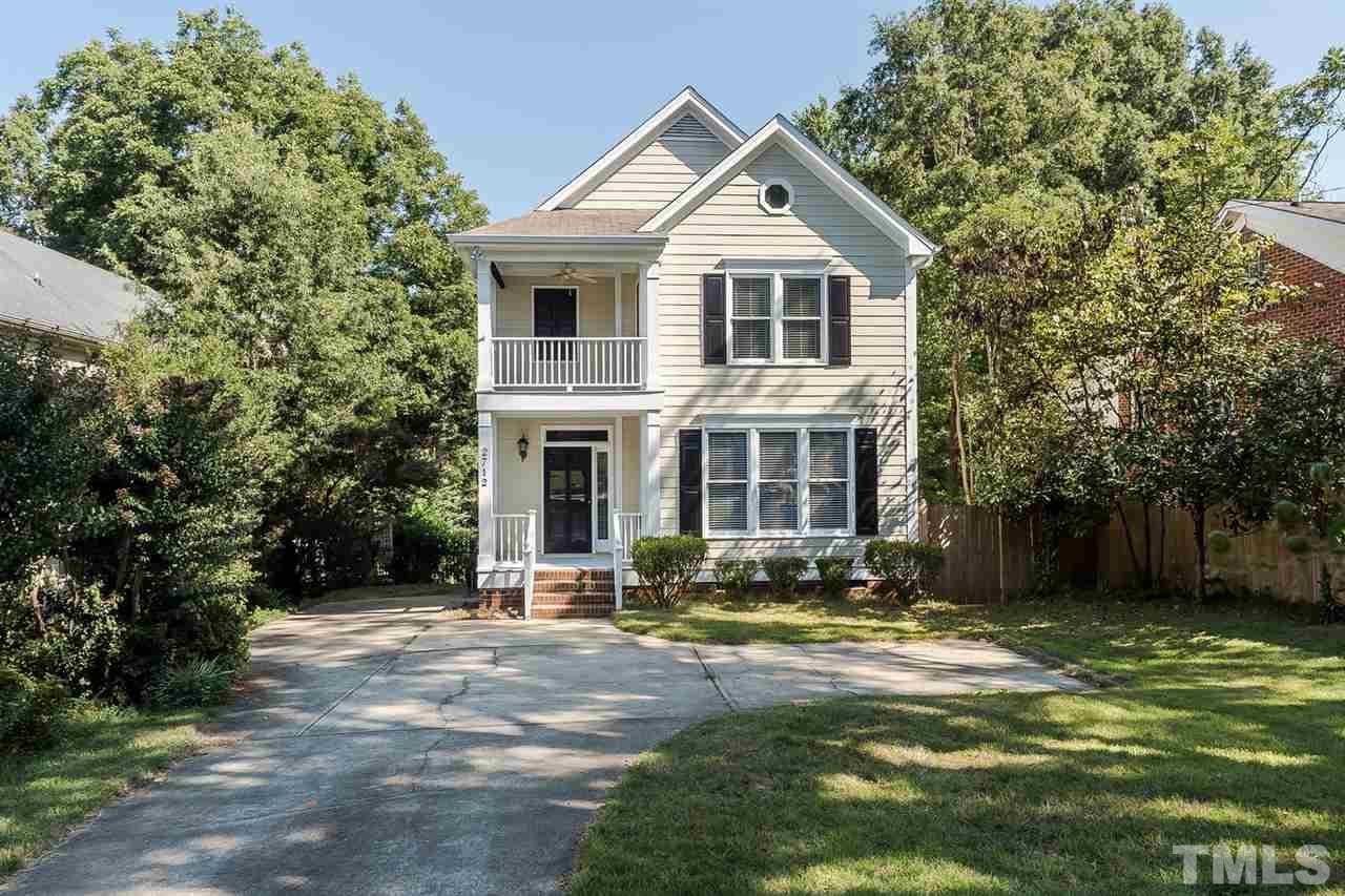2712 Clark Avenue Raleigh, NC 27607 - Photo 1 of 24 a front view of a house with a yard