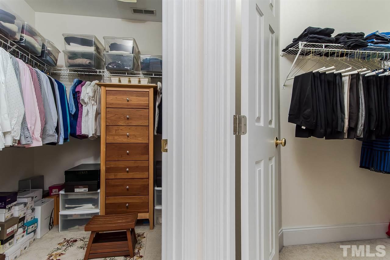 2712 Clark Avenue Raleigh, NC 27607 - Photo 15 of 24 a view of walk in closet with clothes and shoes