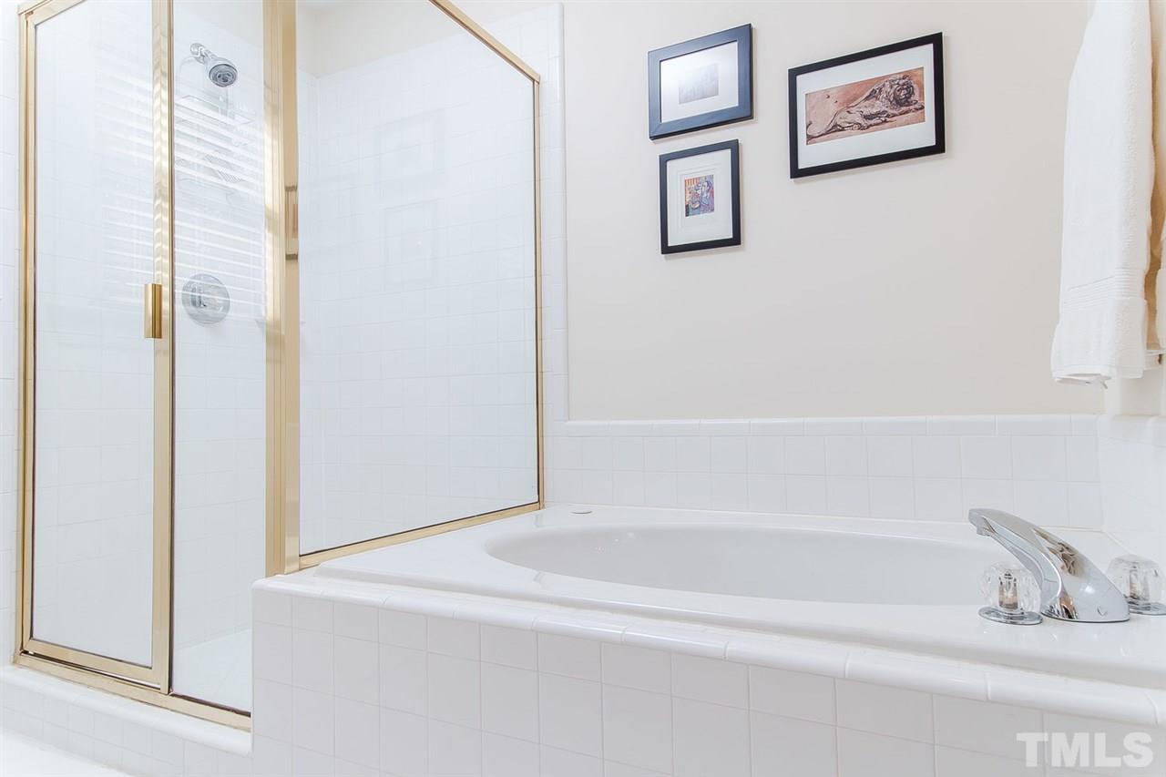 2712 Clark Avenue Raleigh, NC 27607 - Photo 17 of 24 a bathroom with a bathtub