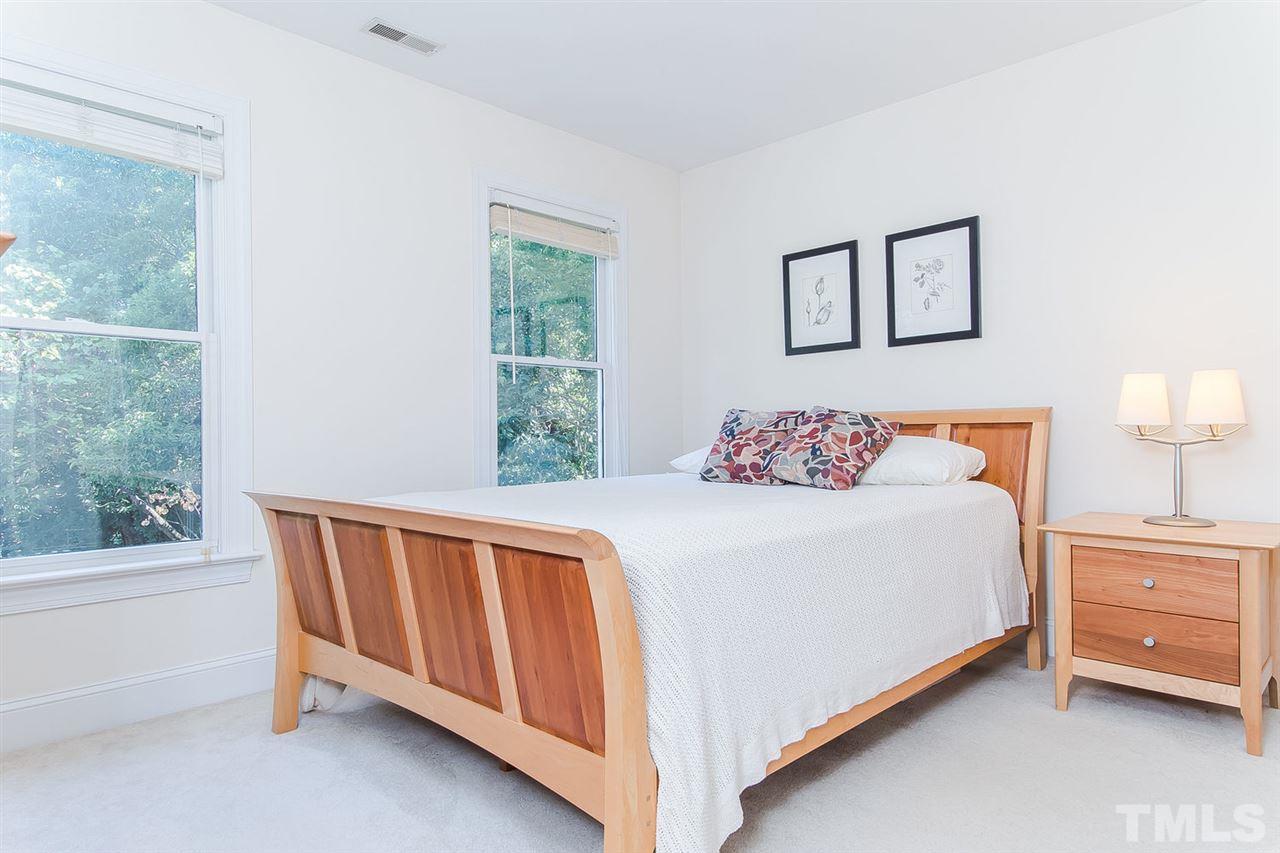 2712 Clark Avenue Raleigh, NC 27607 - Photo 19 of 24 a bedroom with a bed and a window