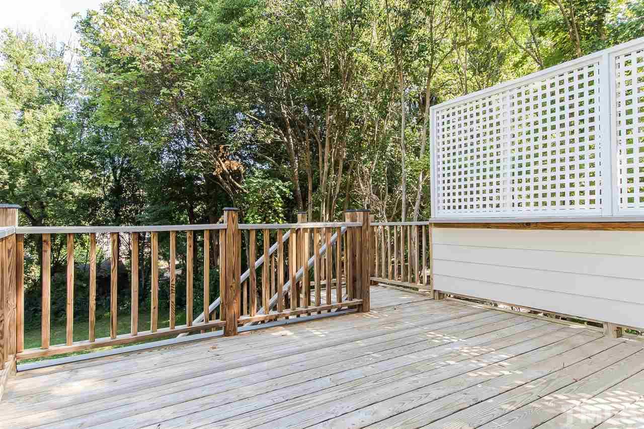 2712 Clark Avenue Raleigh, NC 27607 - Photo 22 of 24 a view of a balcony with wooden floor