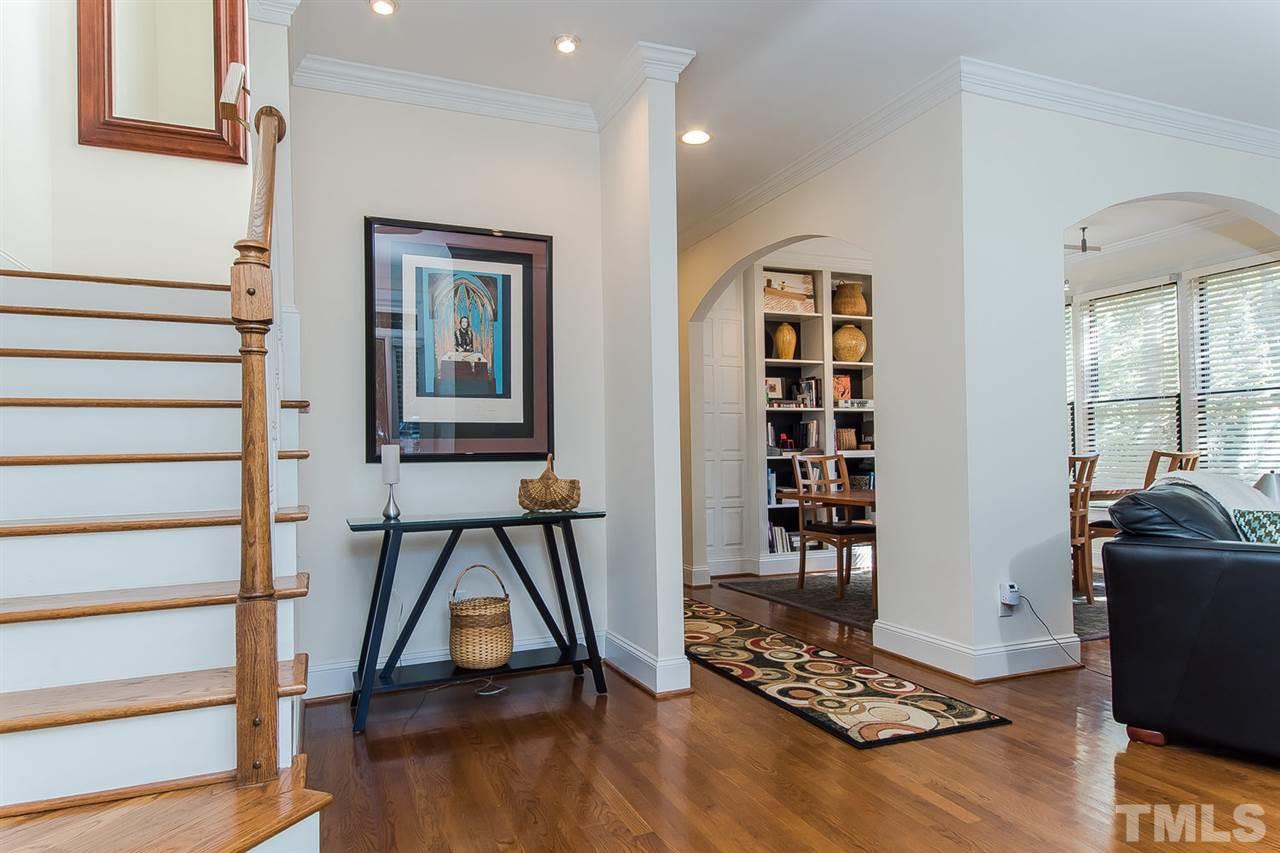 2712 Clark Avenue Raleigh, NC 27607 - Photo 3 of 24 a view of an empty room and wooden floor