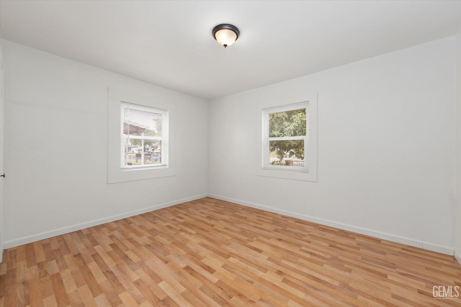 Undisclosed Address Bakersfield, CA 93308 - Photo 21 of 32 a view of an empty room with a window