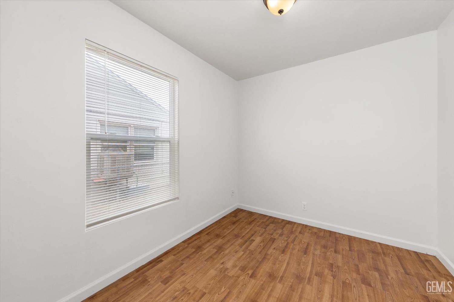 Undisclosed Address Bakersfield, CA 93308 - Photo 26 of 32 an empty room with a window