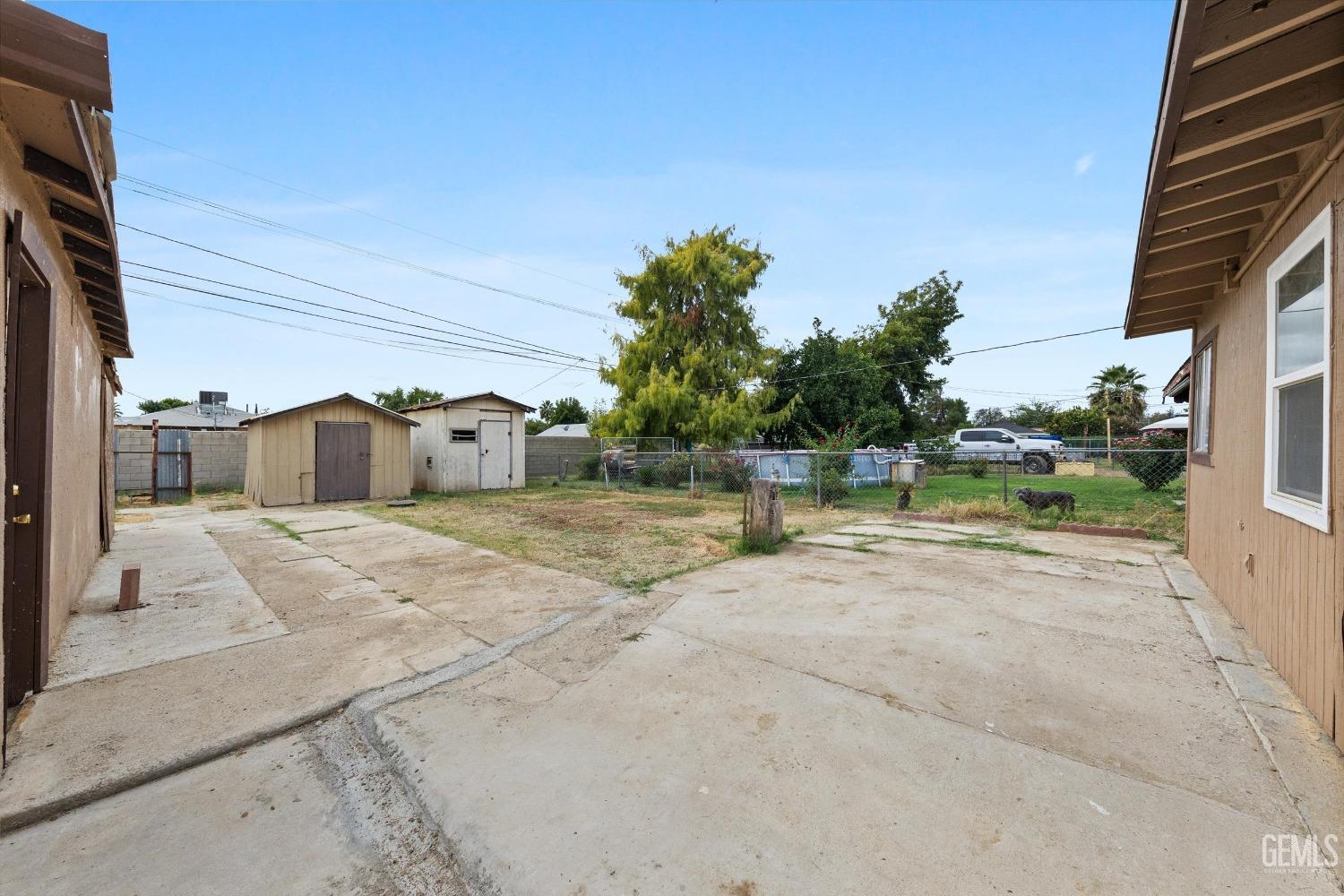 Undisclosed Address Bakersfield, CA 93308 - Photo 28 of 32 a house with a yard