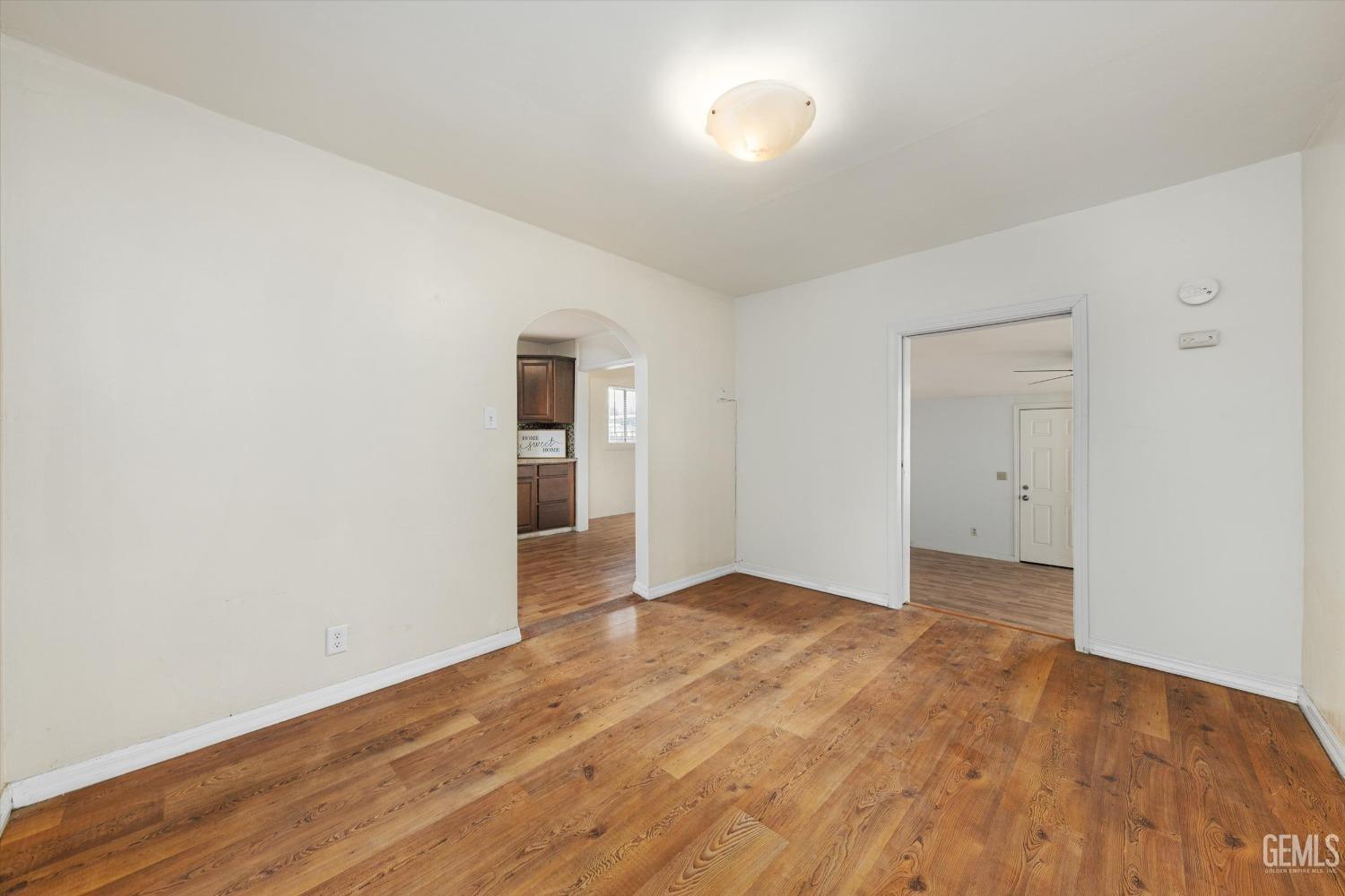 Undisclosed Address Bakersfield, CA 93308 - Photo 8 of 32 wooden floor in an empty room