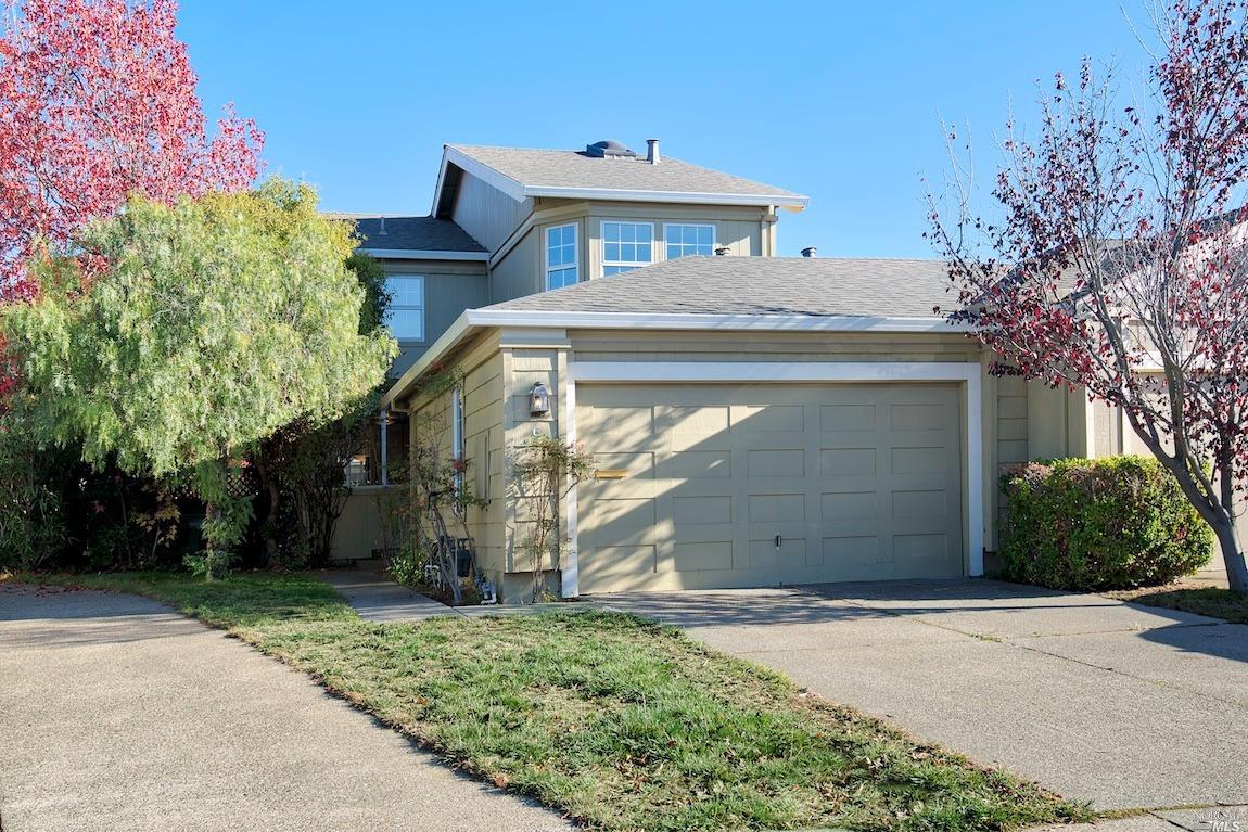 6 Hingham Cove San Rafael, CA 94901 - Photo 1 of 1 a front view of a house with a yard and garage