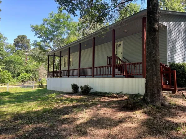a view of a back yard of the house