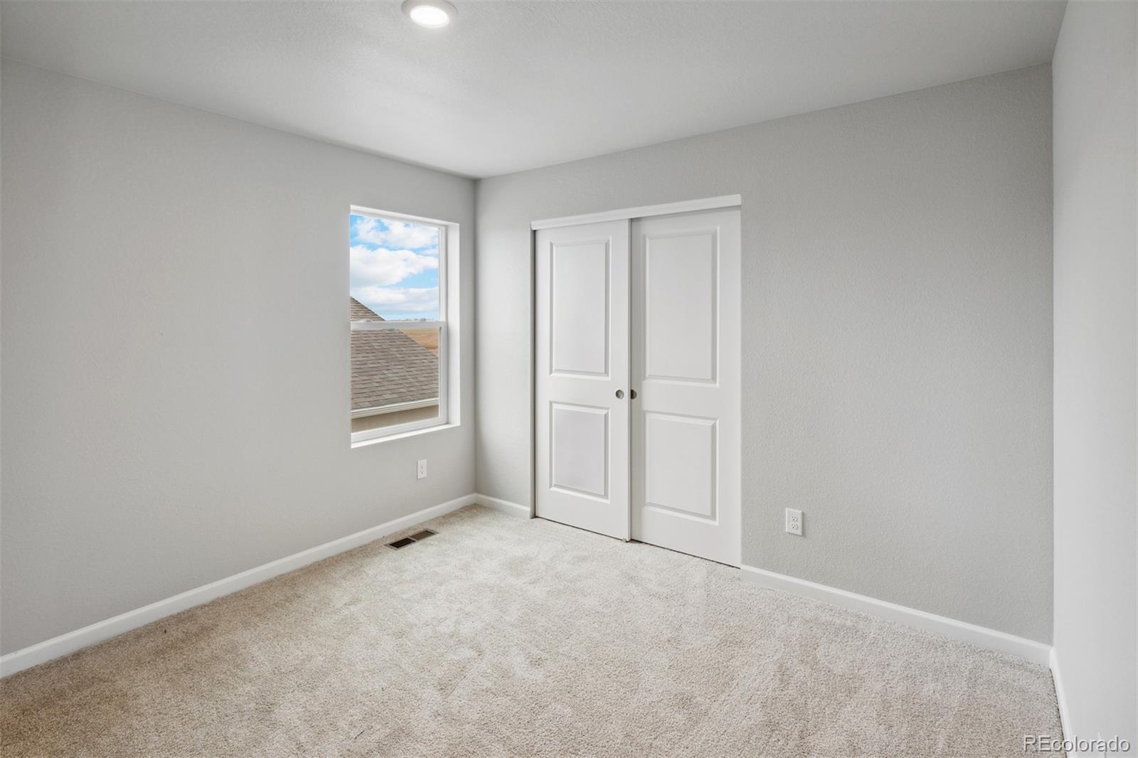 2160 Christina Street Fort Lupton, CO 80621 - Photo 15 of 41 an empty room with windows