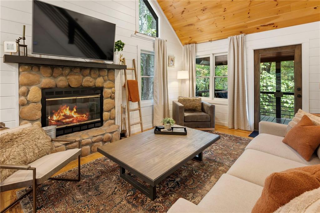 120 Brookhaven Trail Blue Ridge, GA 30513 - Photo 20 of 100 a living room with furniture and a fireplace